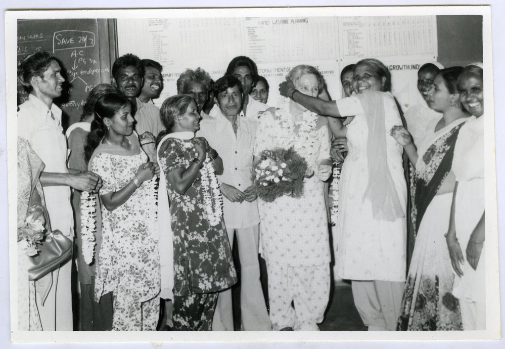 An unidentified Indian woman touches Beryl Howie's head during Howie's farewell, Christian Medical College and Hospital, Ludhiana