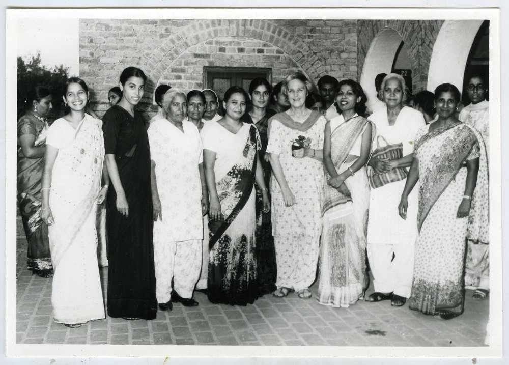 Beryl Howie stands among unidentified Indian women and men during her farewell, Christian Medical College and Hospital, Ludhiana