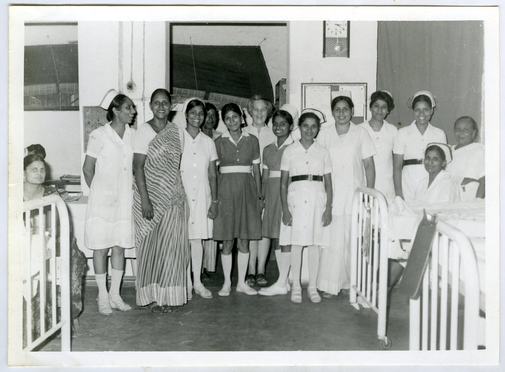 Beryl Howie stands in the background among nurses at the Christian Medical College and Hospital, Ludhiana