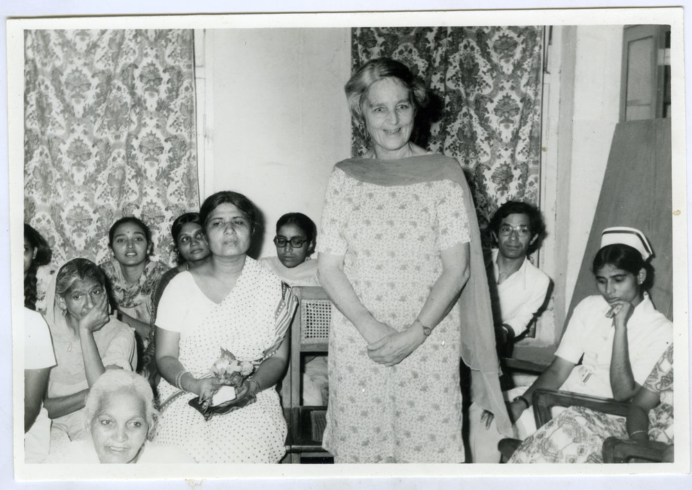 Beryl Howie stands among unidentified seated Indian women, Christian Medical College and Hospital, Ludhiana