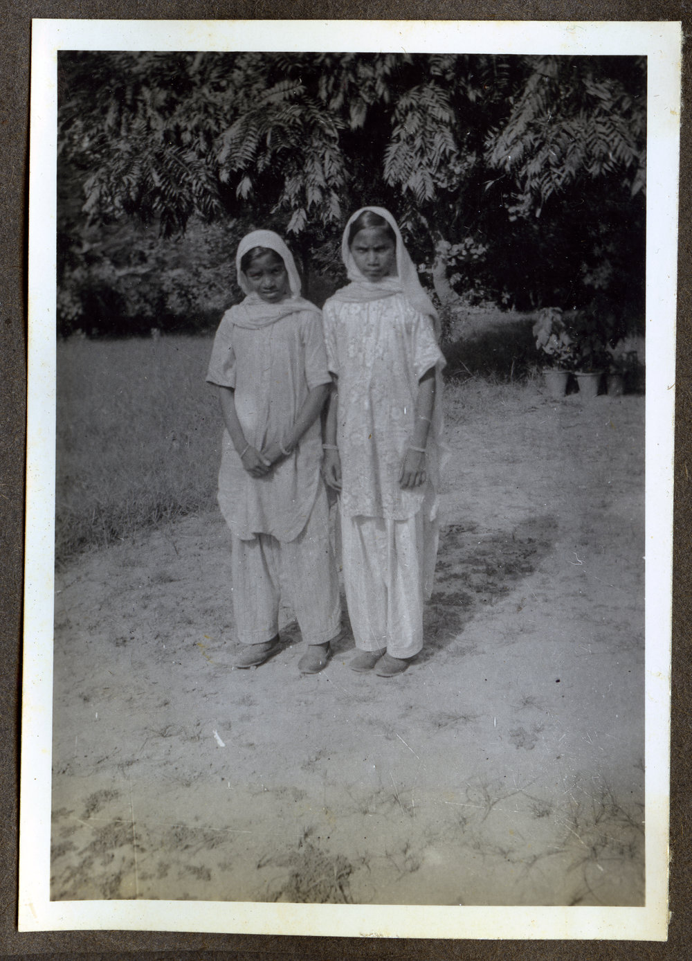 "Ready for school," two Indian girls 