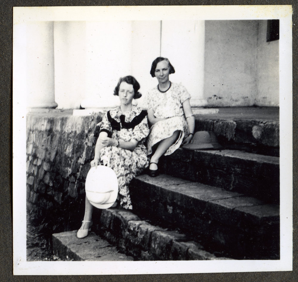 "Molly Ryburn and Mary Cole," seated on steps 
