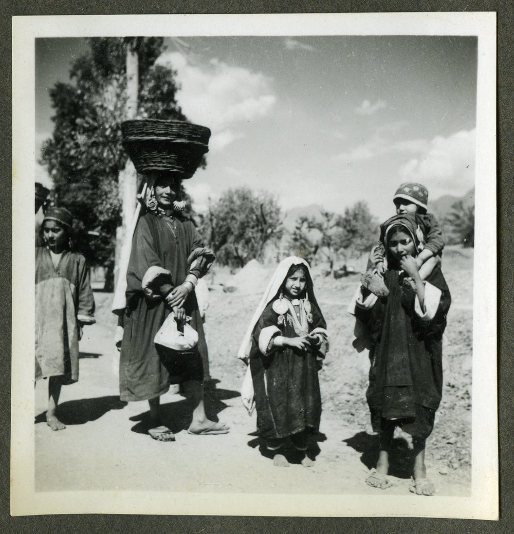 "Kashmir Types," a small group of unidentified young women and children walking