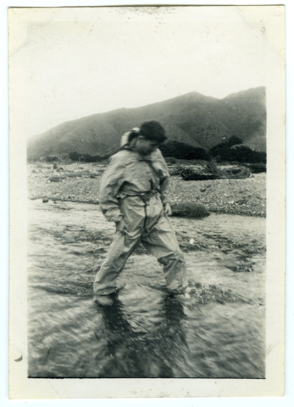 "Ross demonstrating how it works," The 1950 tramp to Orongorongo Valley, Presbyterian Harrier Club - Wellington