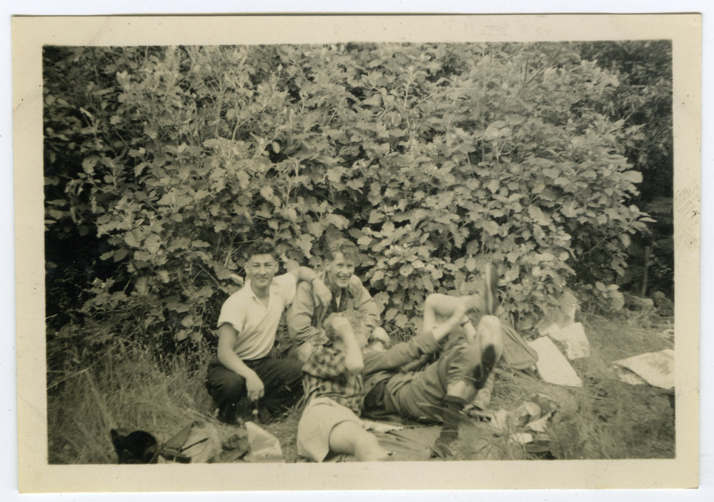 "2/5 co-operating with photographer,' The 1950 Tramp back to Orongorongo Valley, Presbyterian Harrier Club - Wellington