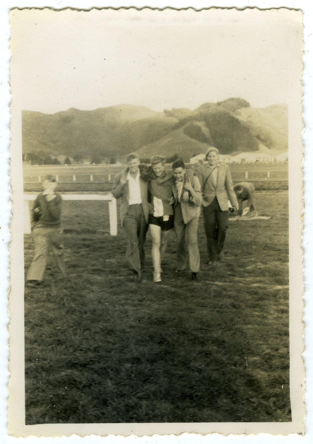 "Norm Wilcox being helped into the dressing rooms," 20 Mile Olympic Gold Cup, Trentham, Presbyterian Harrier Club - Wellington