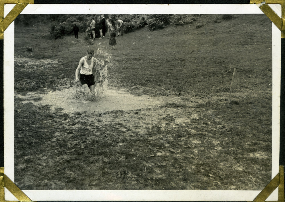 "Oo, nasty, horrid, mud; Albert Pledger," Shaw Baton Relay Race, Johnsonville, 1960, Presbyterian Harrier Club - Wellington