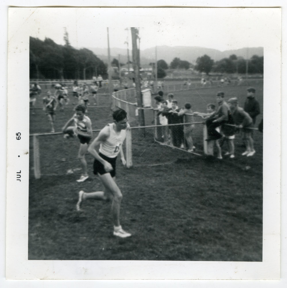 John Boswell leads Alan Thorley (Methodist) over the gates in Trentham Memorial Park." 