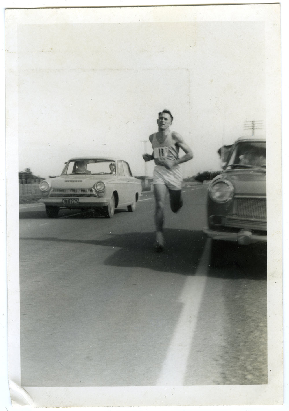 "Lap 10. Norm Gosling, flanked by Shaw and Kaywood Cars," Masterton Relay 1968, Presbyterian Harrier Club - Wellington