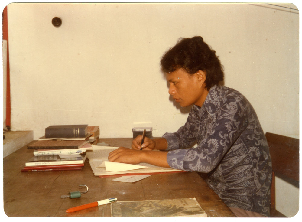 Desmon Kantjai at His Desk
