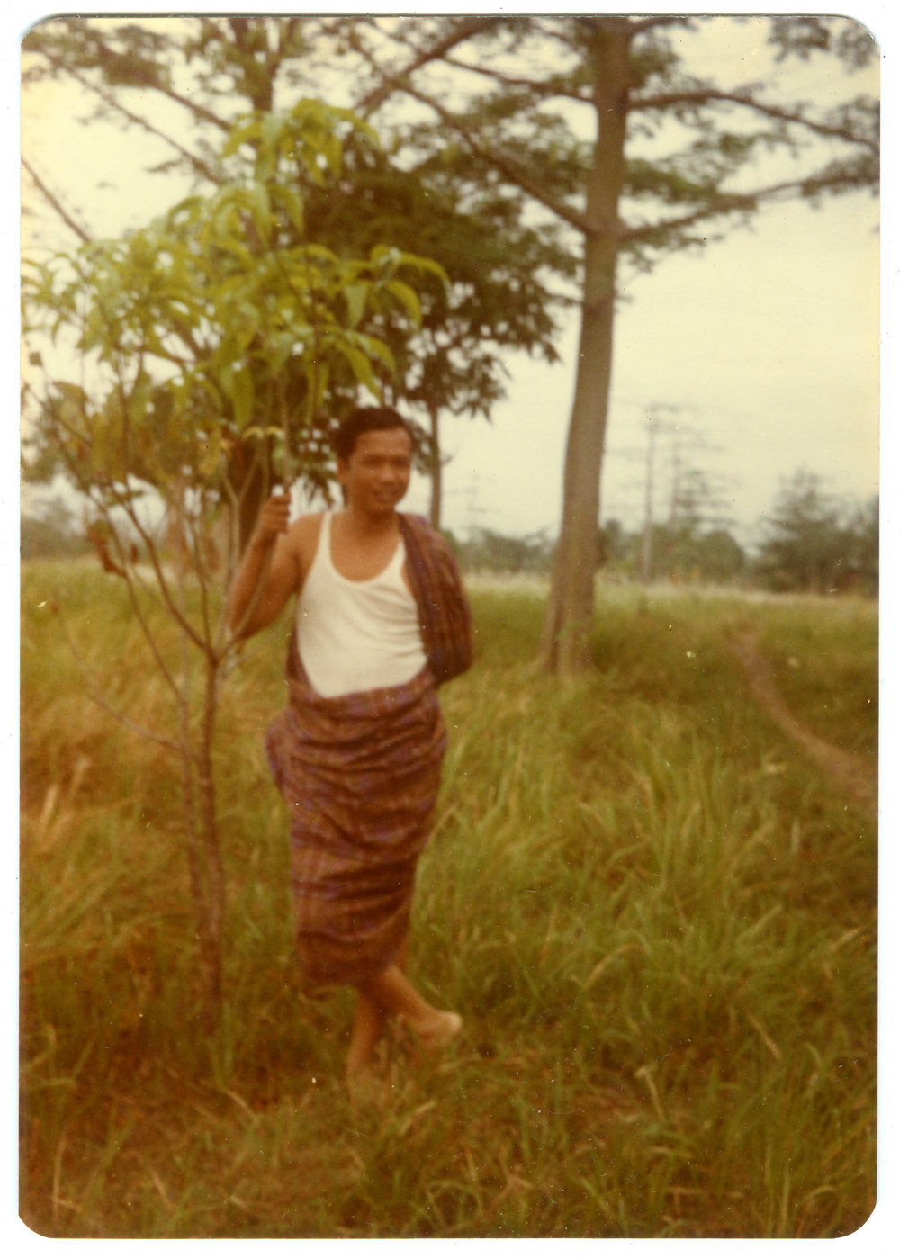 Ruben Kapa Outside the Home of His Parents