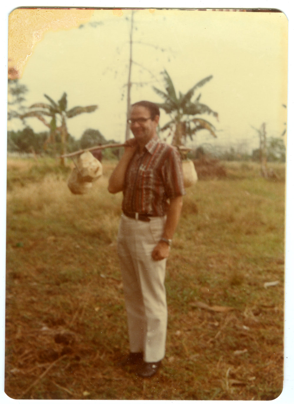 Robert Patterson Carrying Coconuts