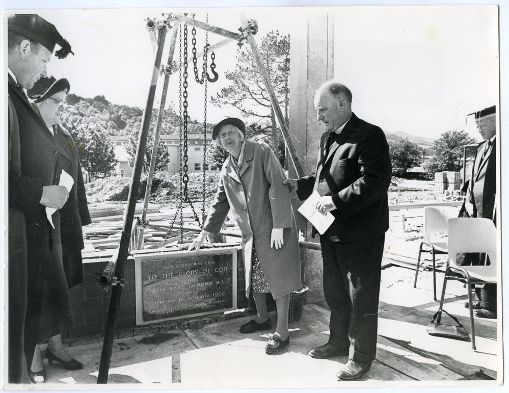 Miss Mary Salmond and Doctor J. D. Salmond lay the foundation stone of the residential hall named after them while Dr. H J Ryburn looks on, 1969