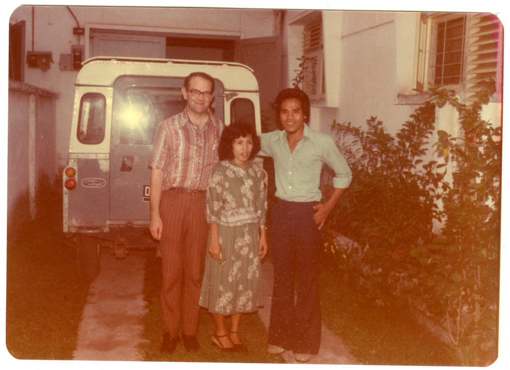 Robert Patterson with Two Tingkat Students, in Front of His House