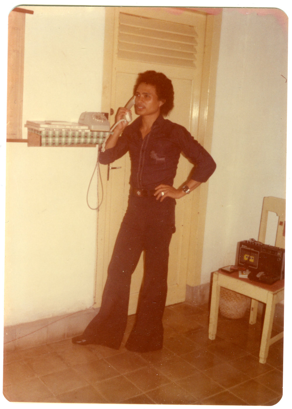 Thomas Paul Sangkide Speaking on Telephone at Robert Patterson's House