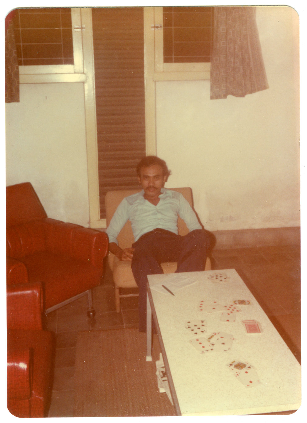 Johny Ogelang Sitting at Robert Patterson's House