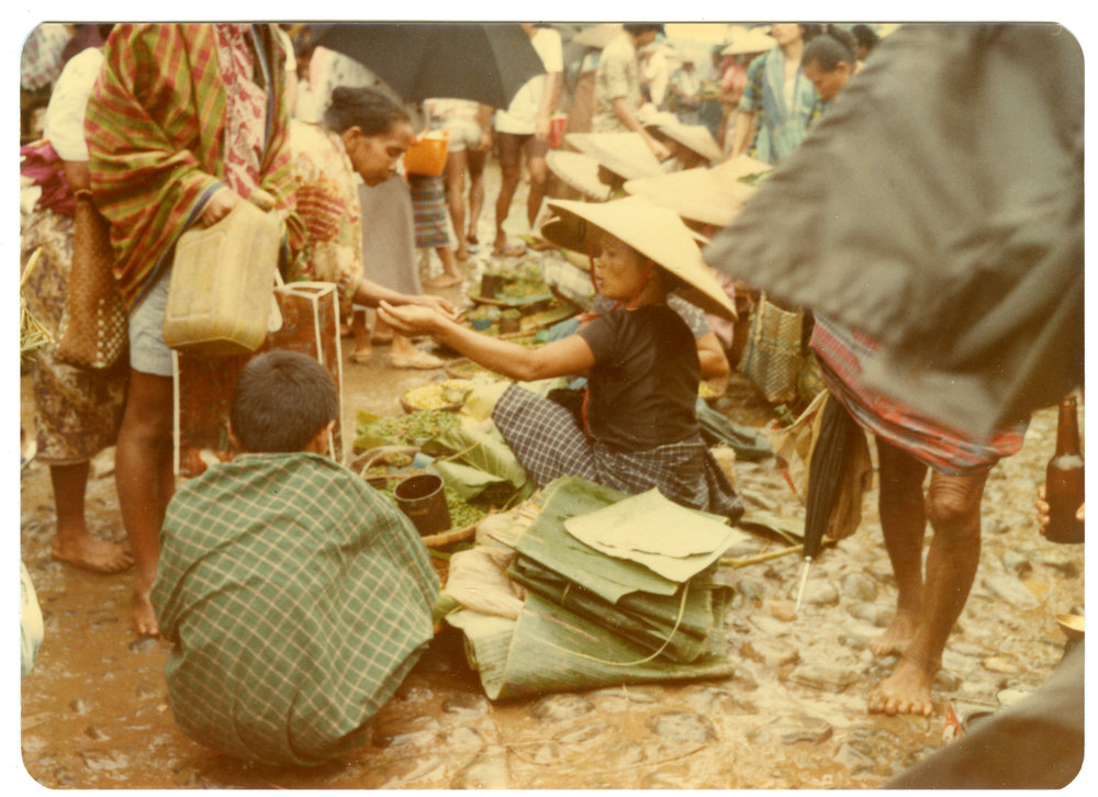 Woman Selling Banana and Bamboo Leaves at the Rantepao Market