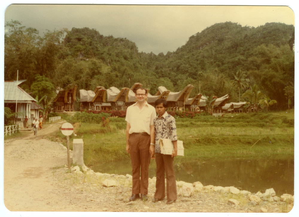 Robert Patterson and Andarias Lebang Outside Kete