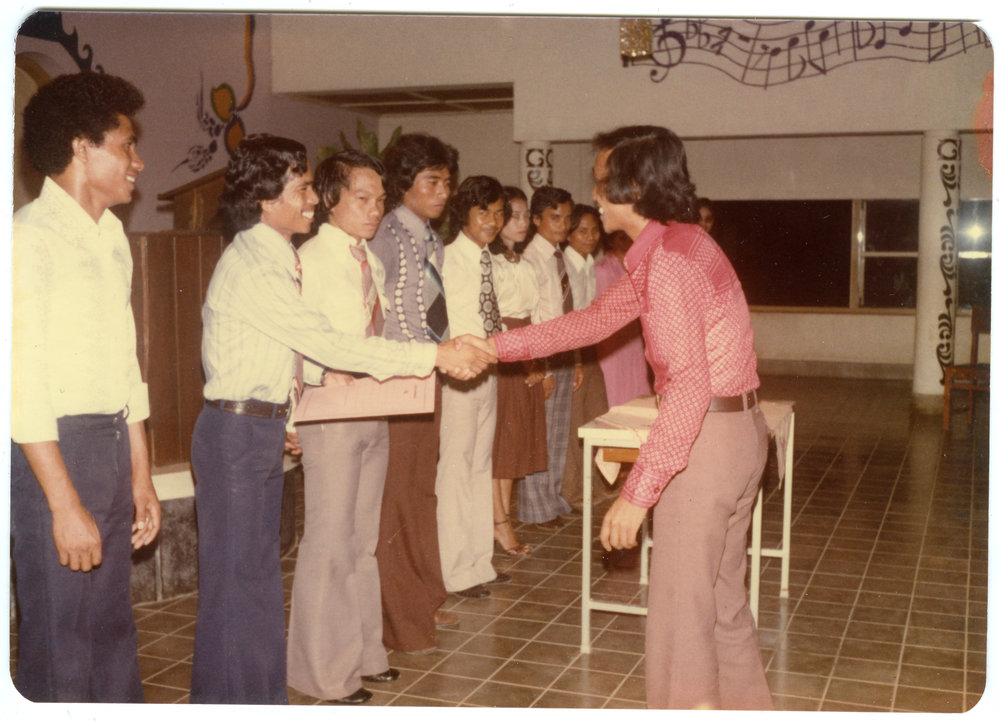 Group of Students Standing in a Hall