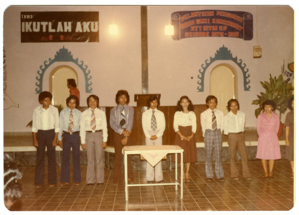 Group of Students Standing in Front of the Hall