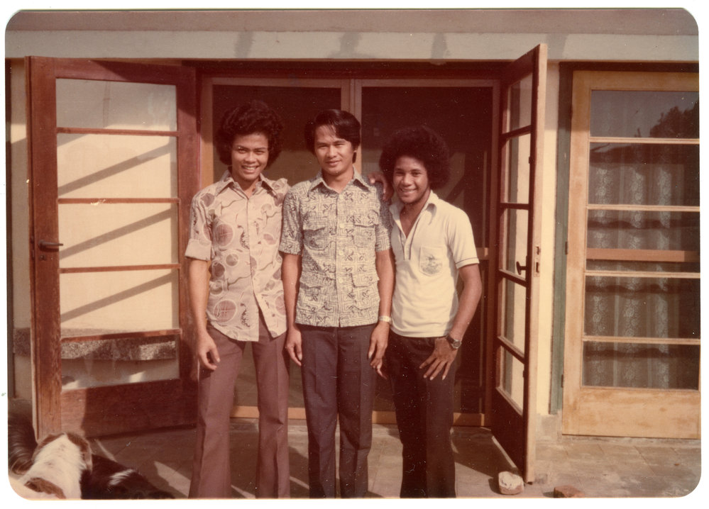 Ifer Sirima, Siskus Manabung and Ekson Tonoro Outside Siscus's Home