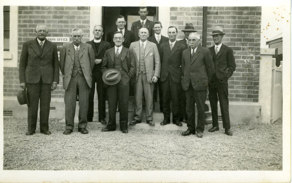 Men Outside Telegraph Office