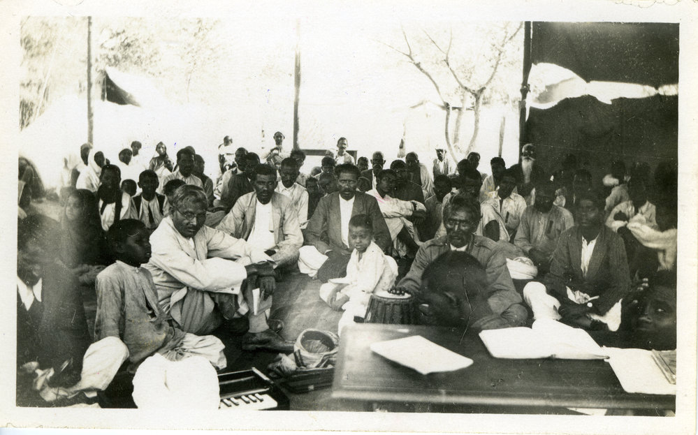 In The Mela Meeting Tent.