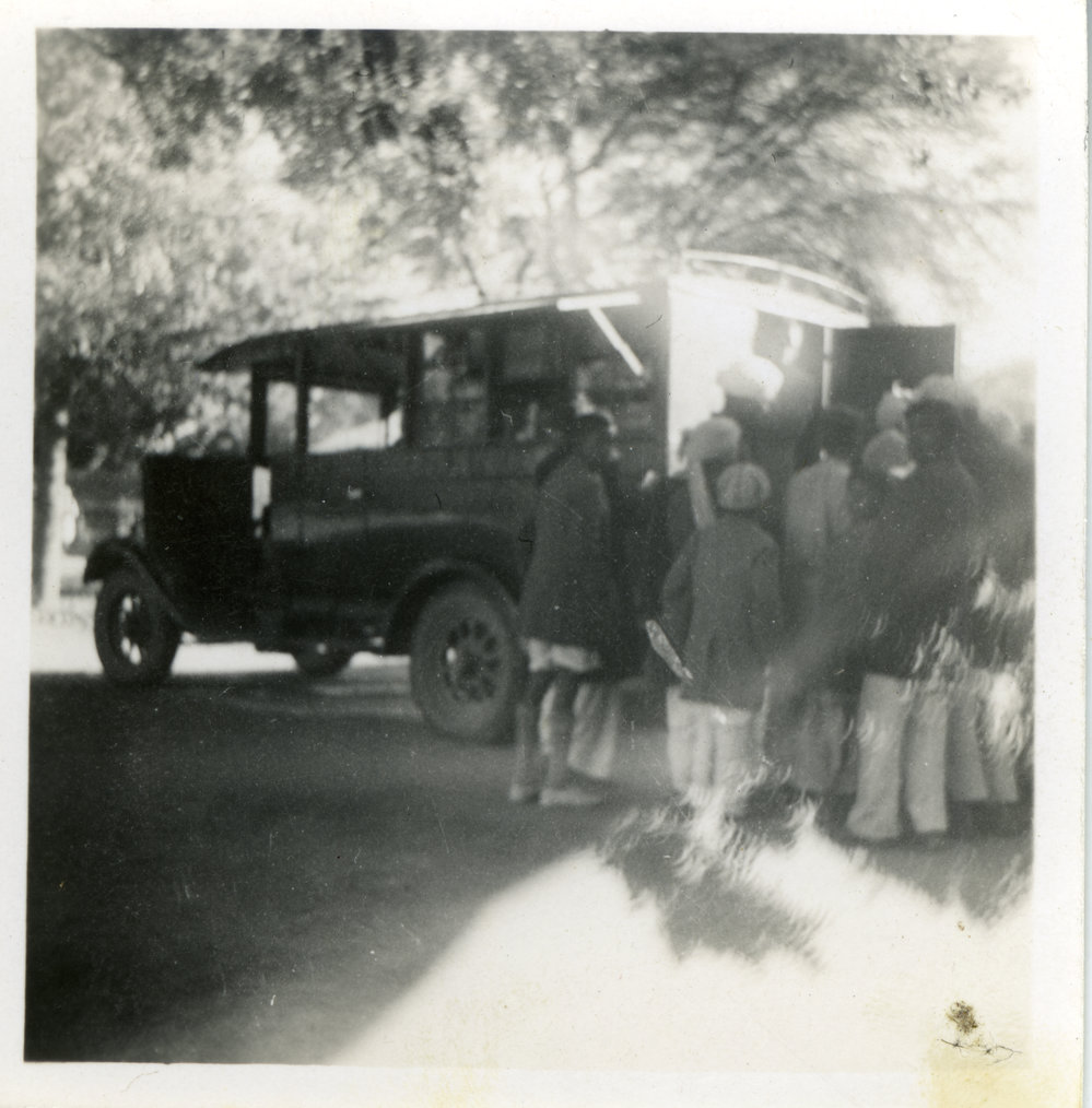 Waiting To Board A Bus.