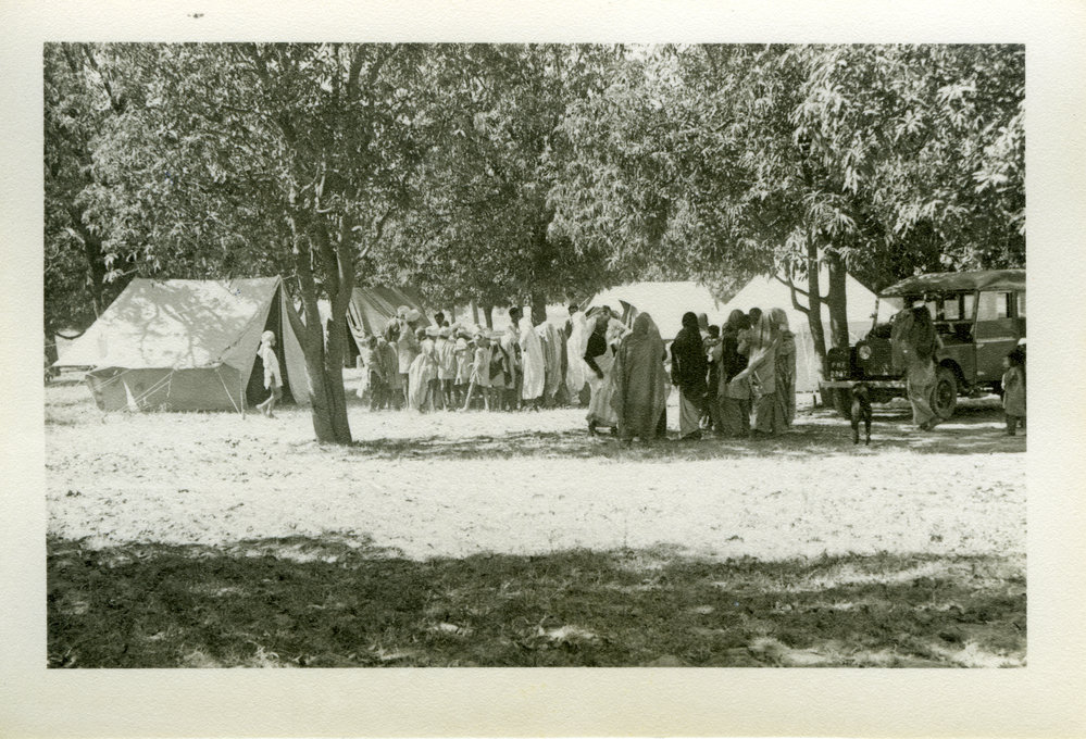 Gathering At A Village Campsite