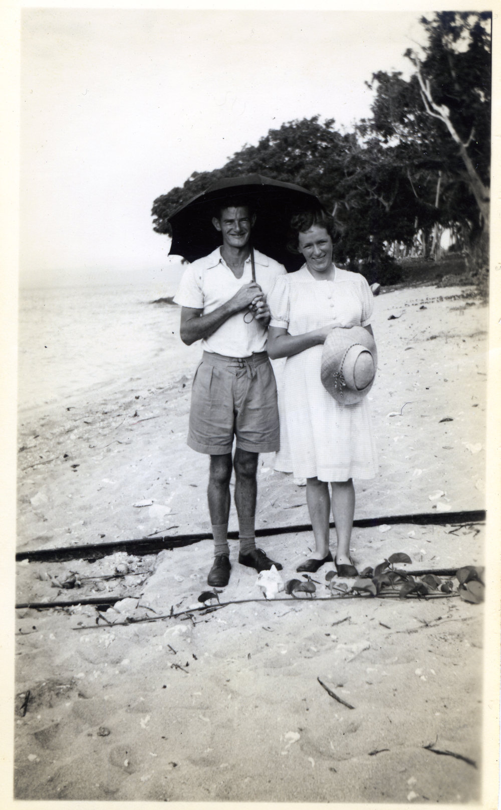 Rev. and Mrs. Horwell on beach at Nguna