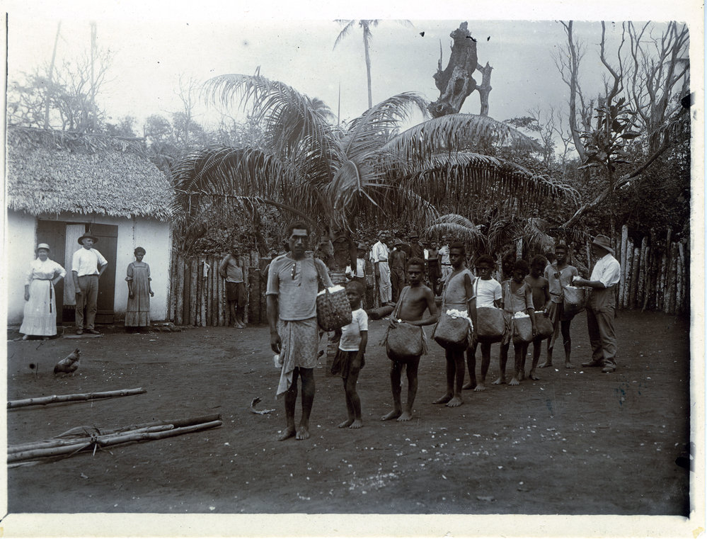 Returning from the plantation with baskets of raw cotton