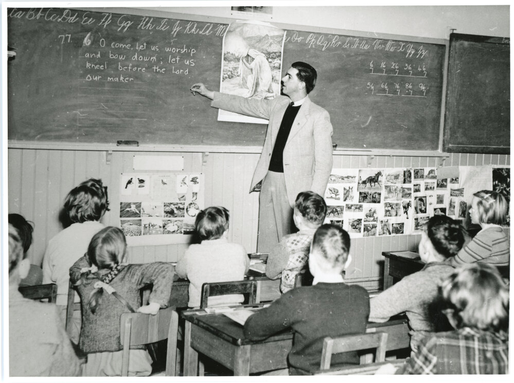 C.T. Styles gives a Bible in school lesson
