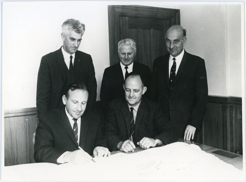 Signing the contract for Salmond Hall