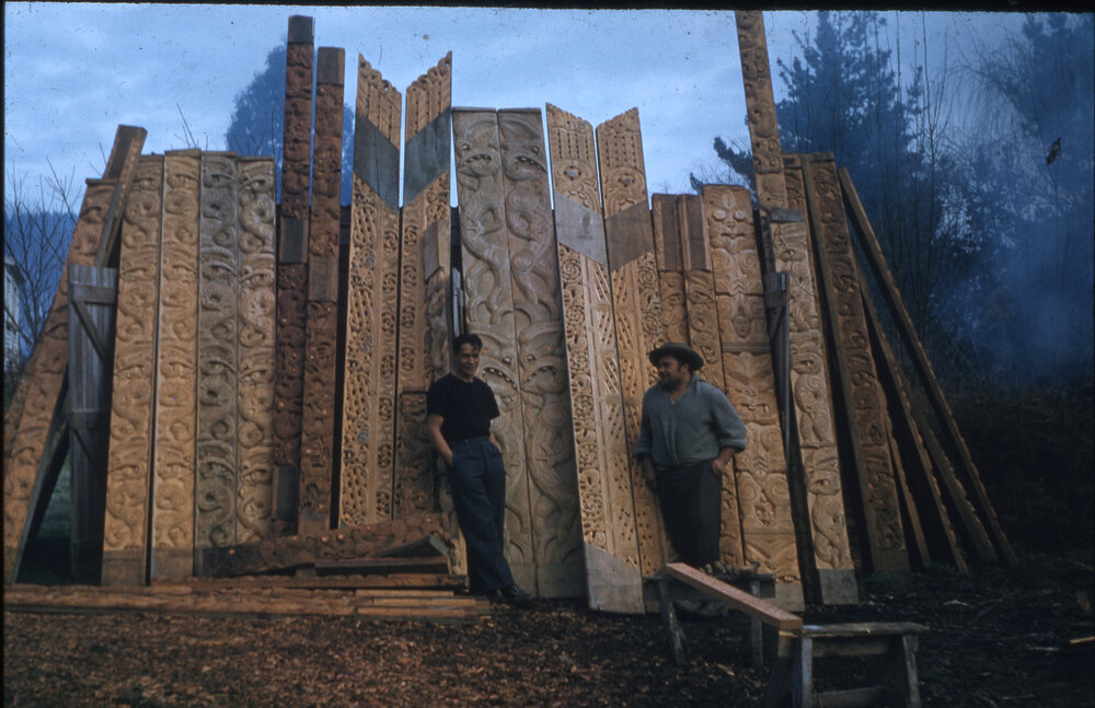 Tete and Barney Standing in Front of The Poupou They Carved