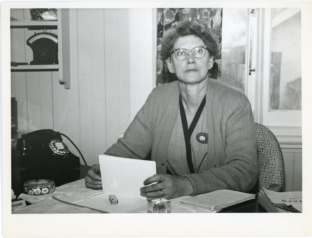 Unknown Woman At Desk