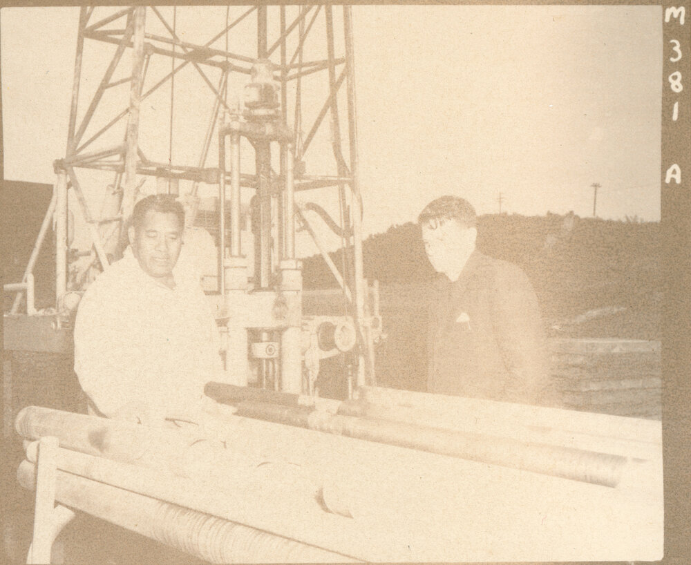 Rev. Bruce M. Patterson and Another Man Inspecting Machinery At Turangi