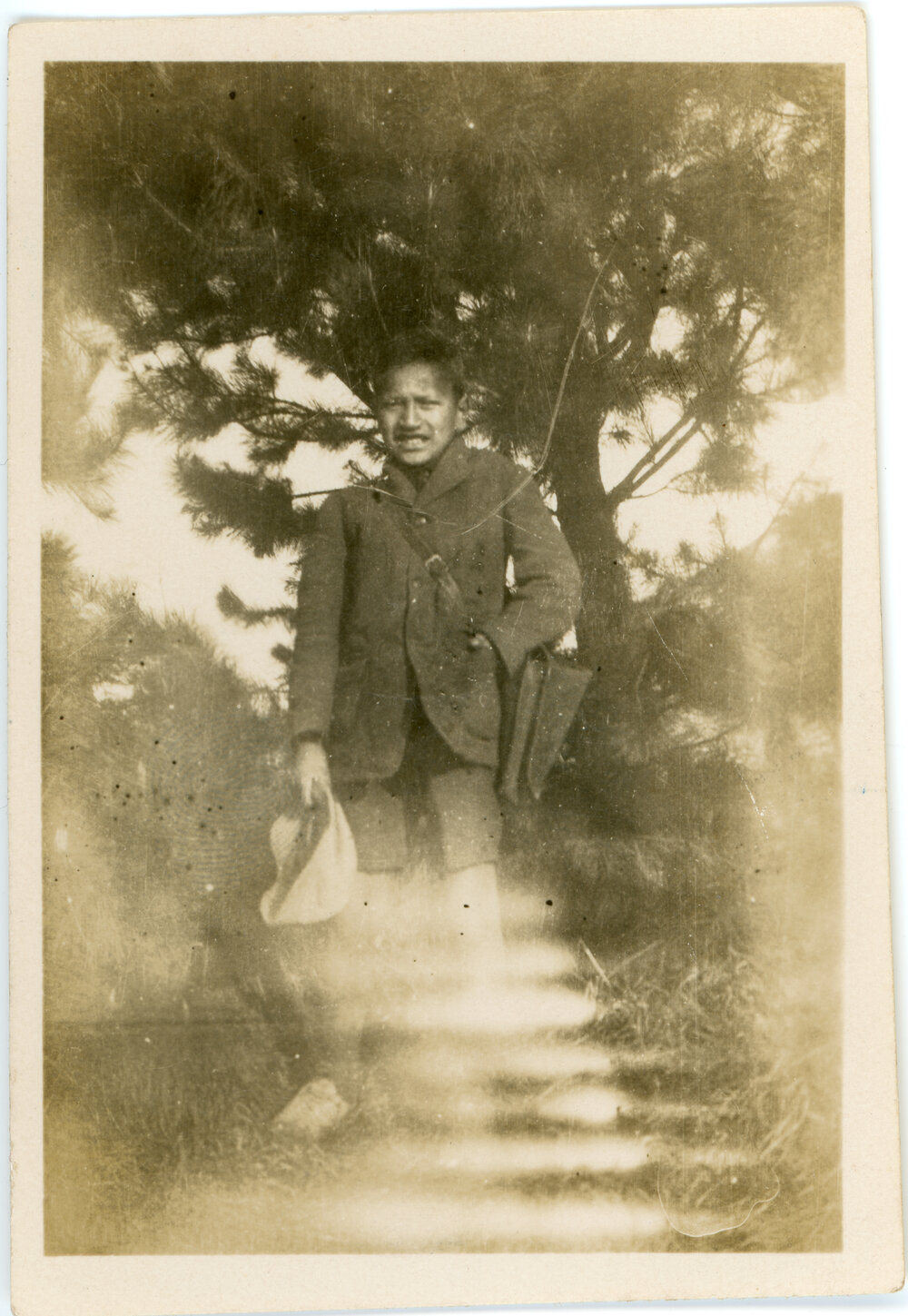 Young Māori Tamaiti In A School Uniform