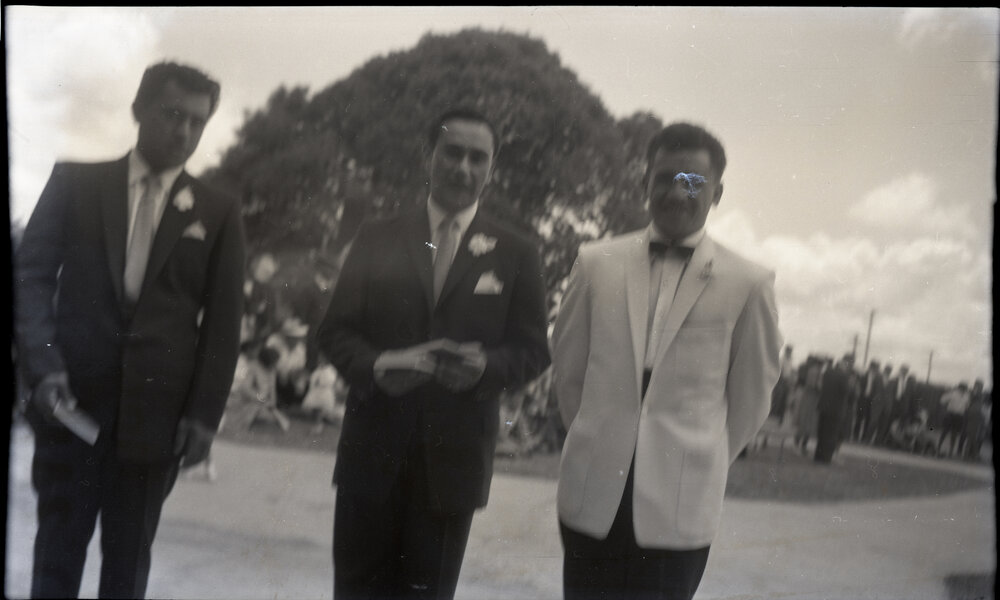 Wedding In Process - The Groom and Two Groomsmen