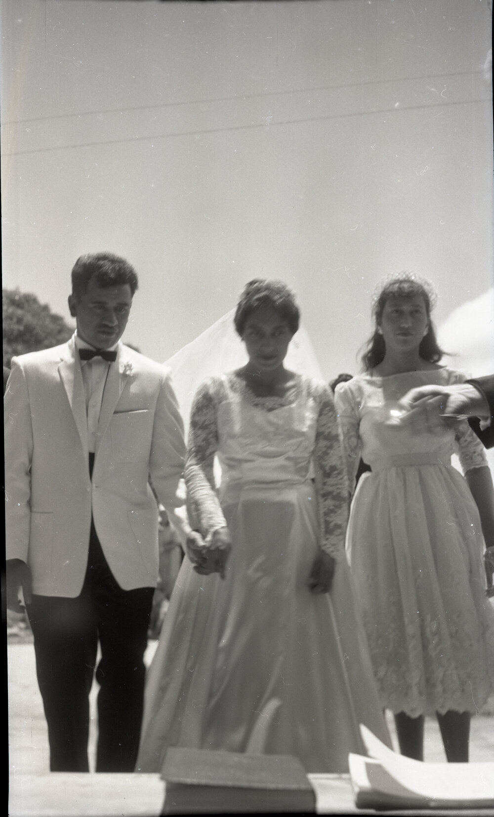Wedding In Process - Bride, Groom, and Maid of Honor