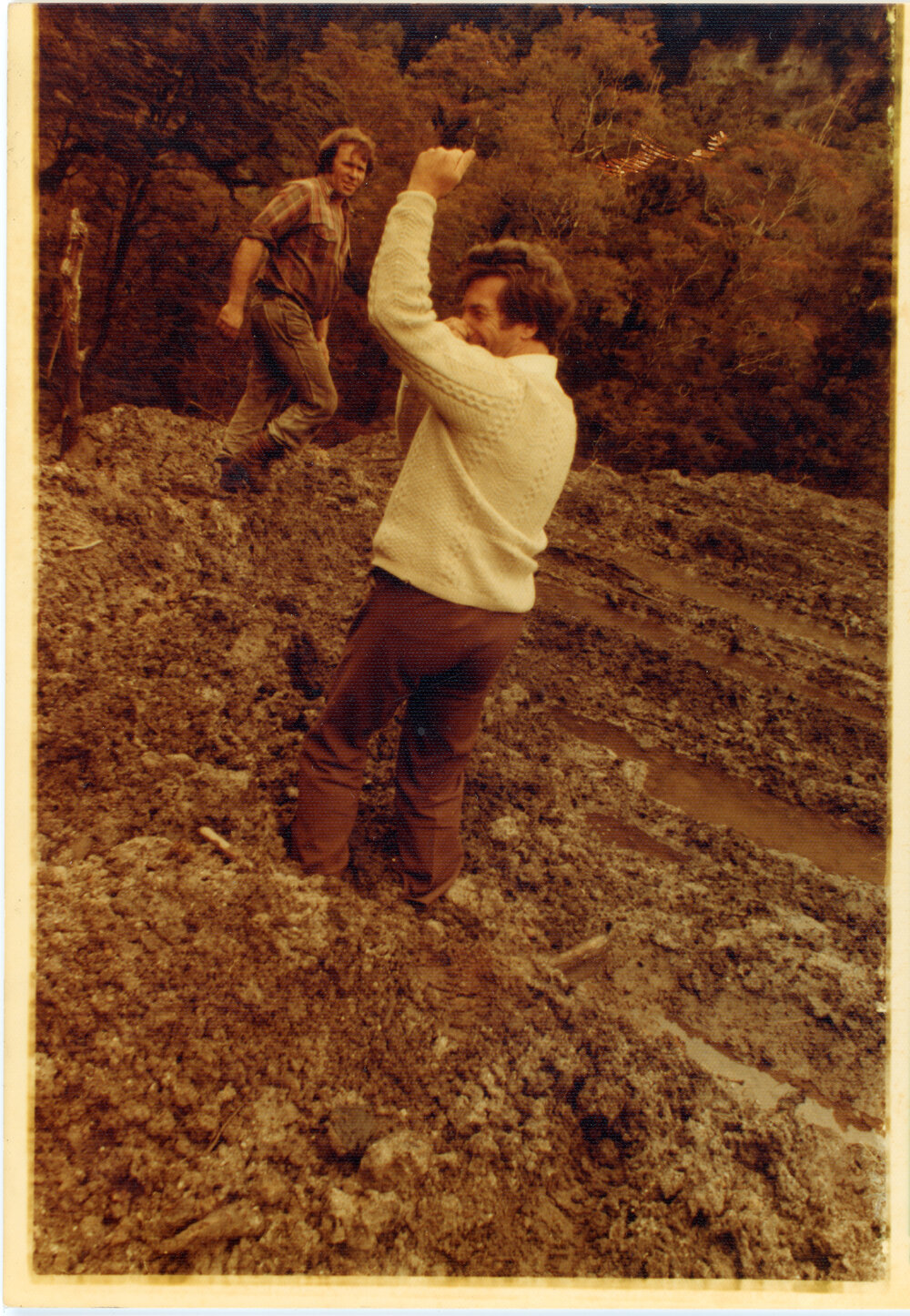 Two Unknown Men In The Dirt