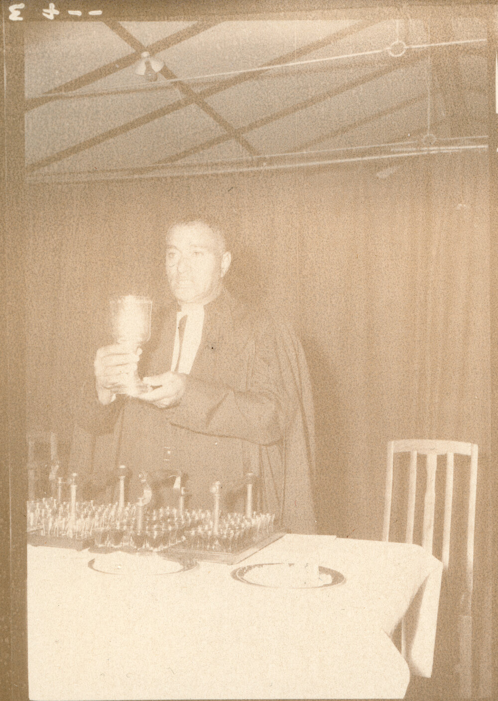 Rev. C. P. Maitai Serving Communion