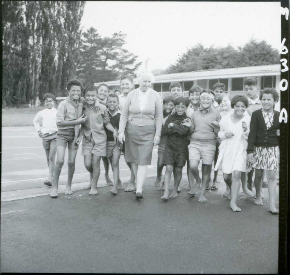 Miss J. M. Milroy and School Children