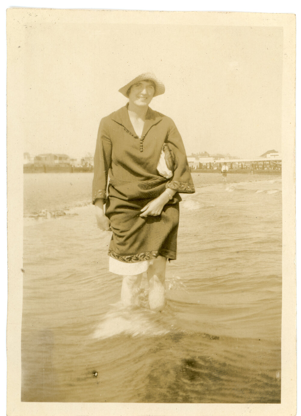 Unknown Woman Wading In The Water