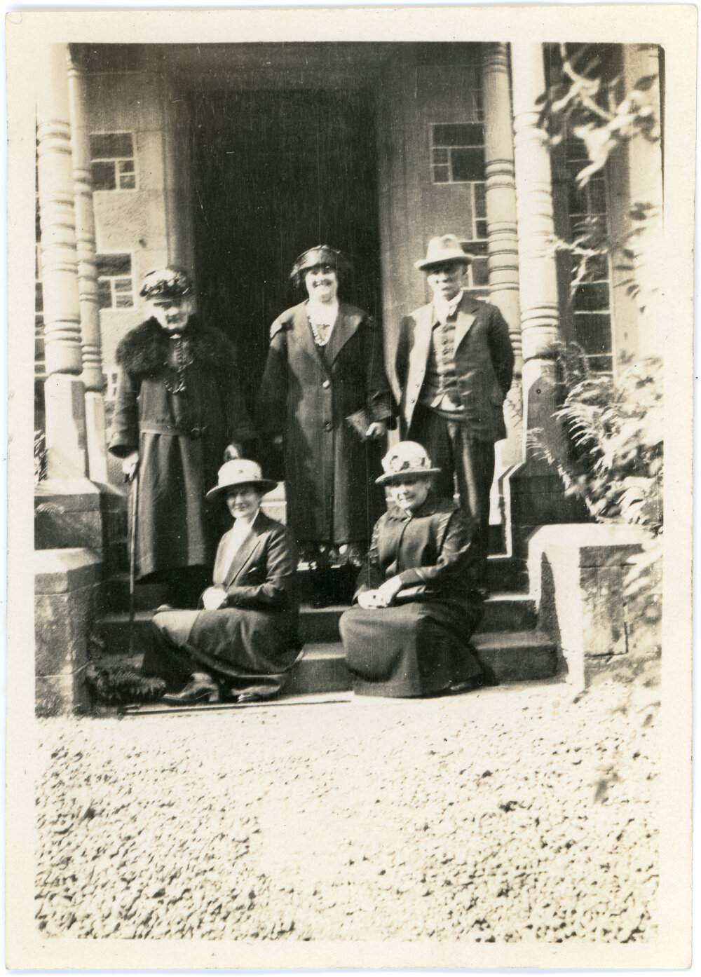 Unknown Group Of Five On The Steps of a Large Building