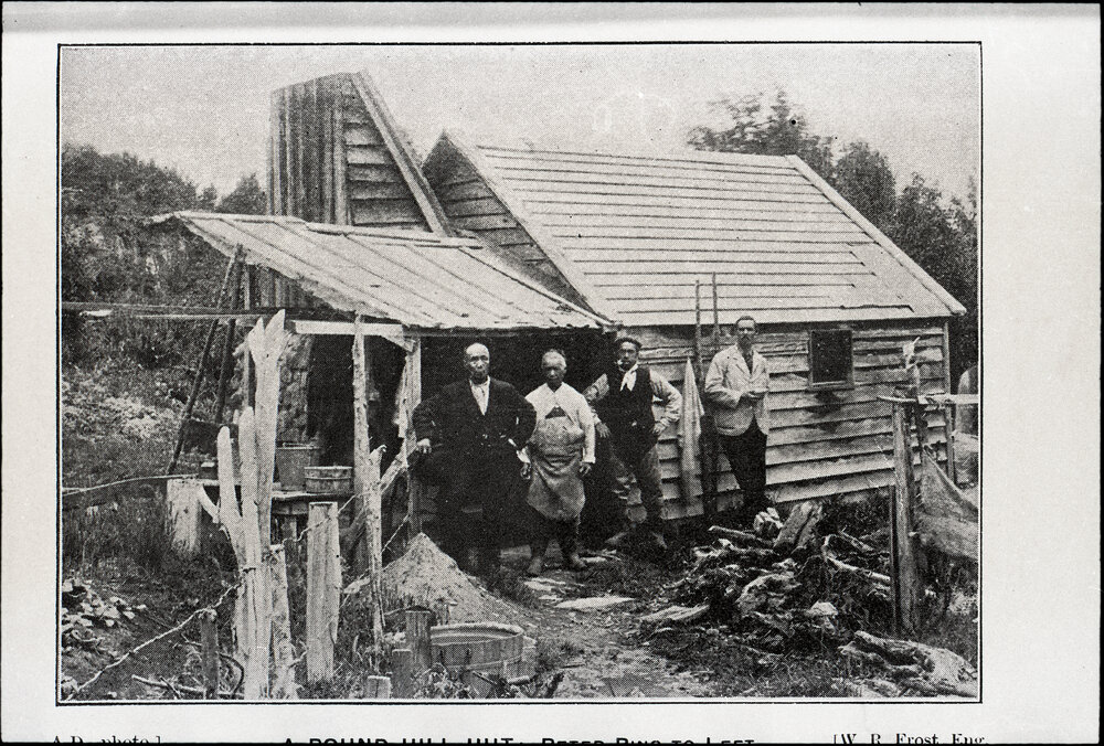 Three Chinese Miners and Rev McNeur Outside their Round Hill Hut