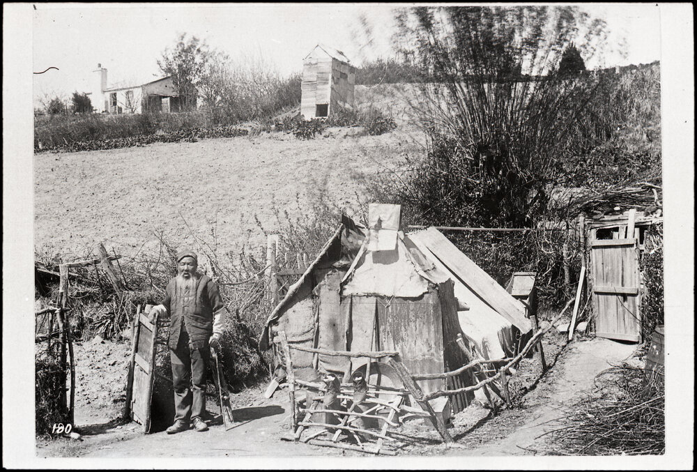 An Elderly Unidentified Chinese Man And His Hut