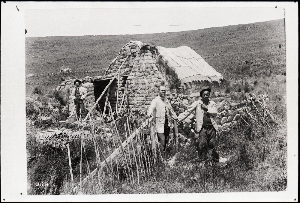 Rev Don Visiting Two Chinese Men At A Sod Home