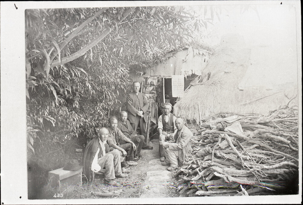 Rev. Don with Five Chinese Men Holding A Meeting