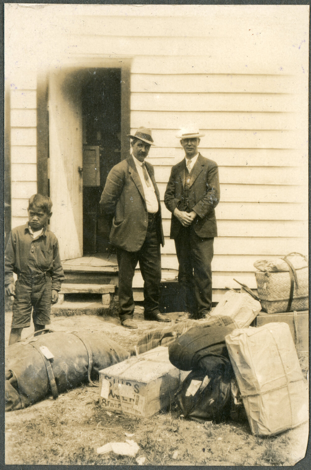 2 Men &amp; Boy Beside Luggage, Te Whaiti