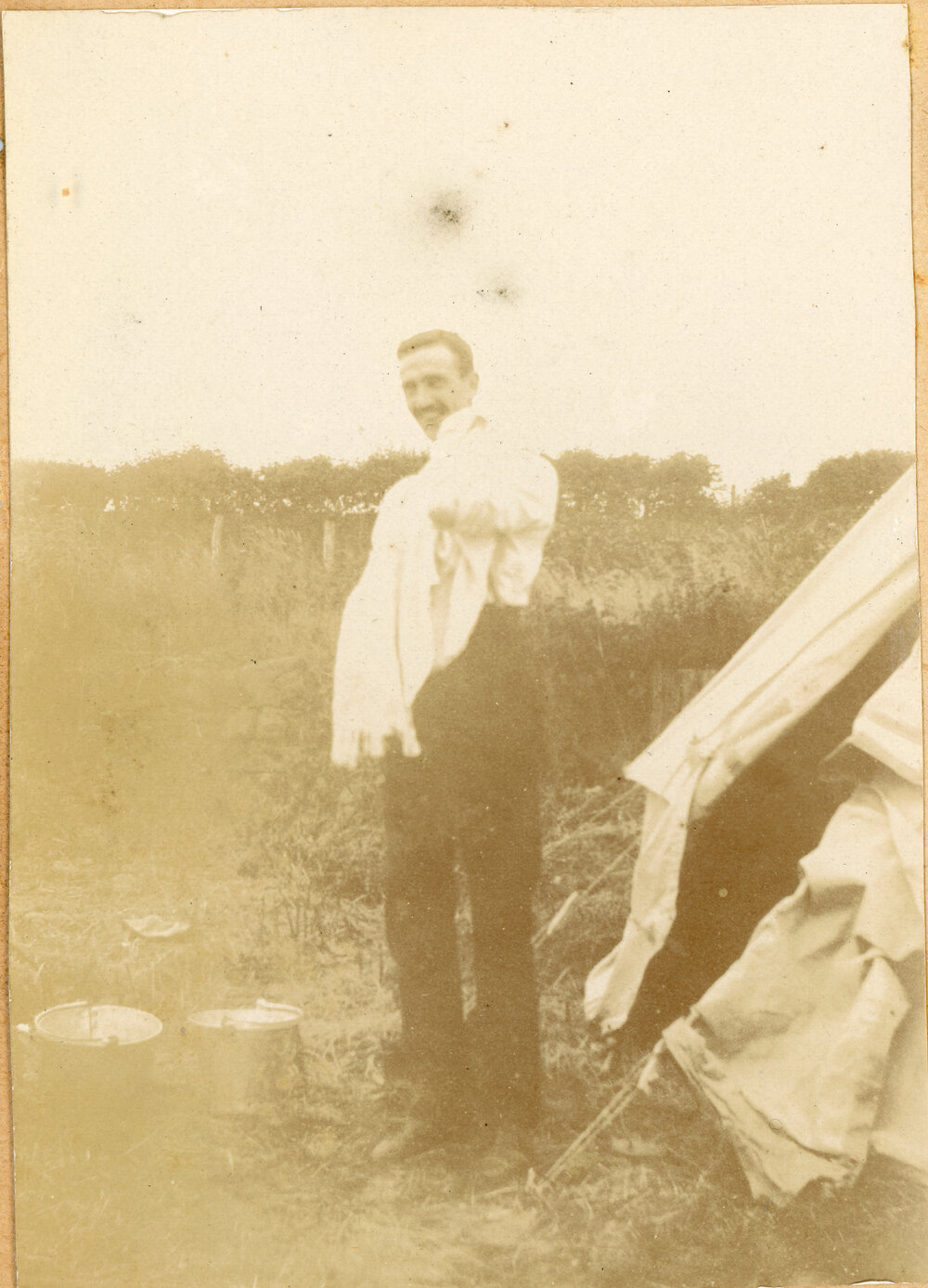 Dr John Kirk Holding An Infant